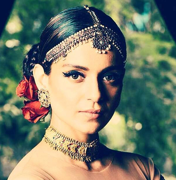 Classic bridal simple bun with sleek front on Kangana Ranaut